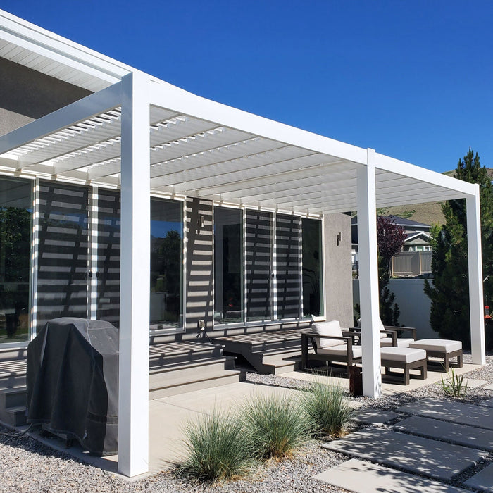 Picture of a 2-post contemporary-style tan vinyl wall-mounted pergola attached to the back wall of a condo