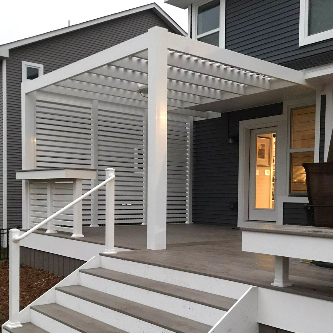 Finished attached outdoor structure illustrating the long-term value of covering a deck