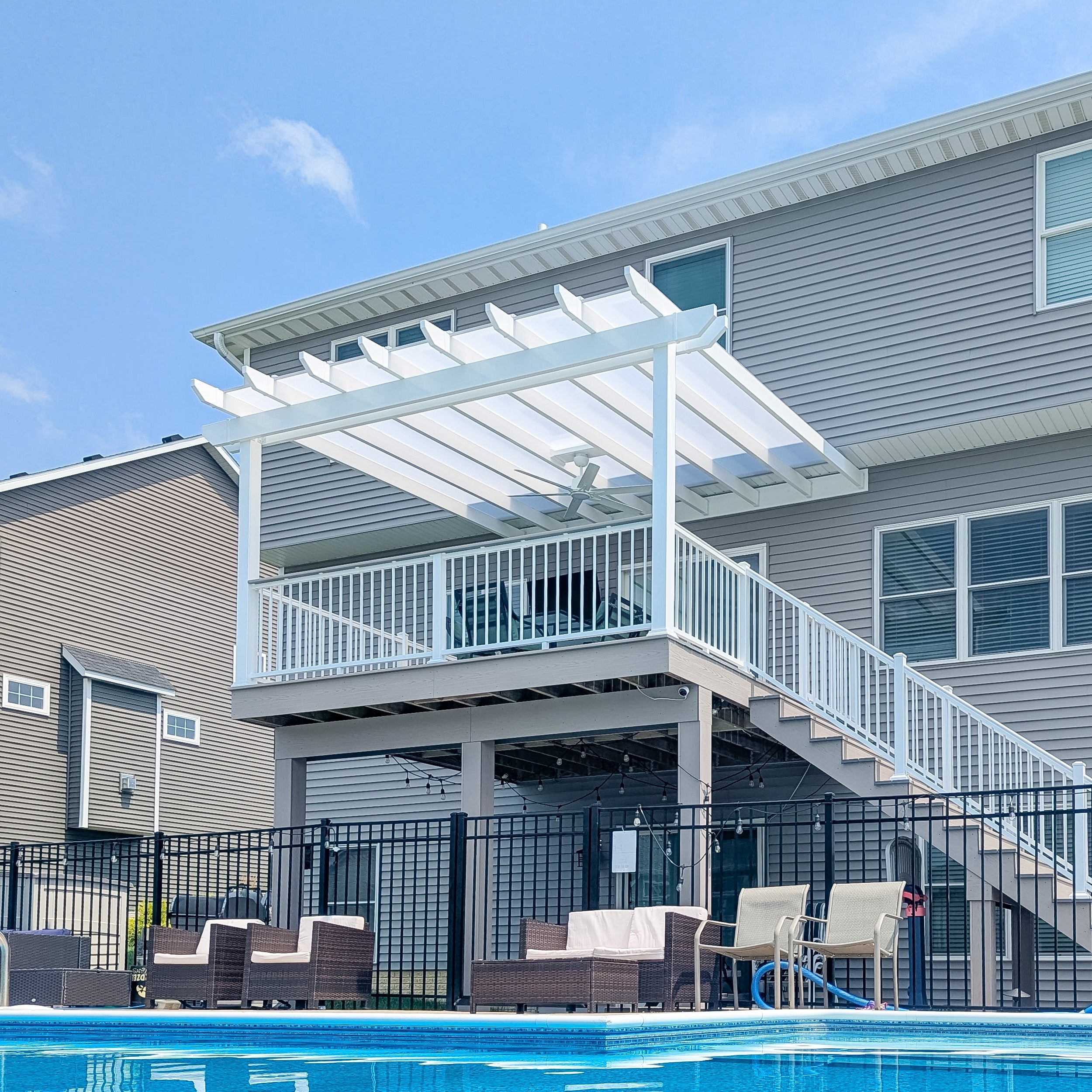 Attached solid-roof patio cover providing protected outdoor living space