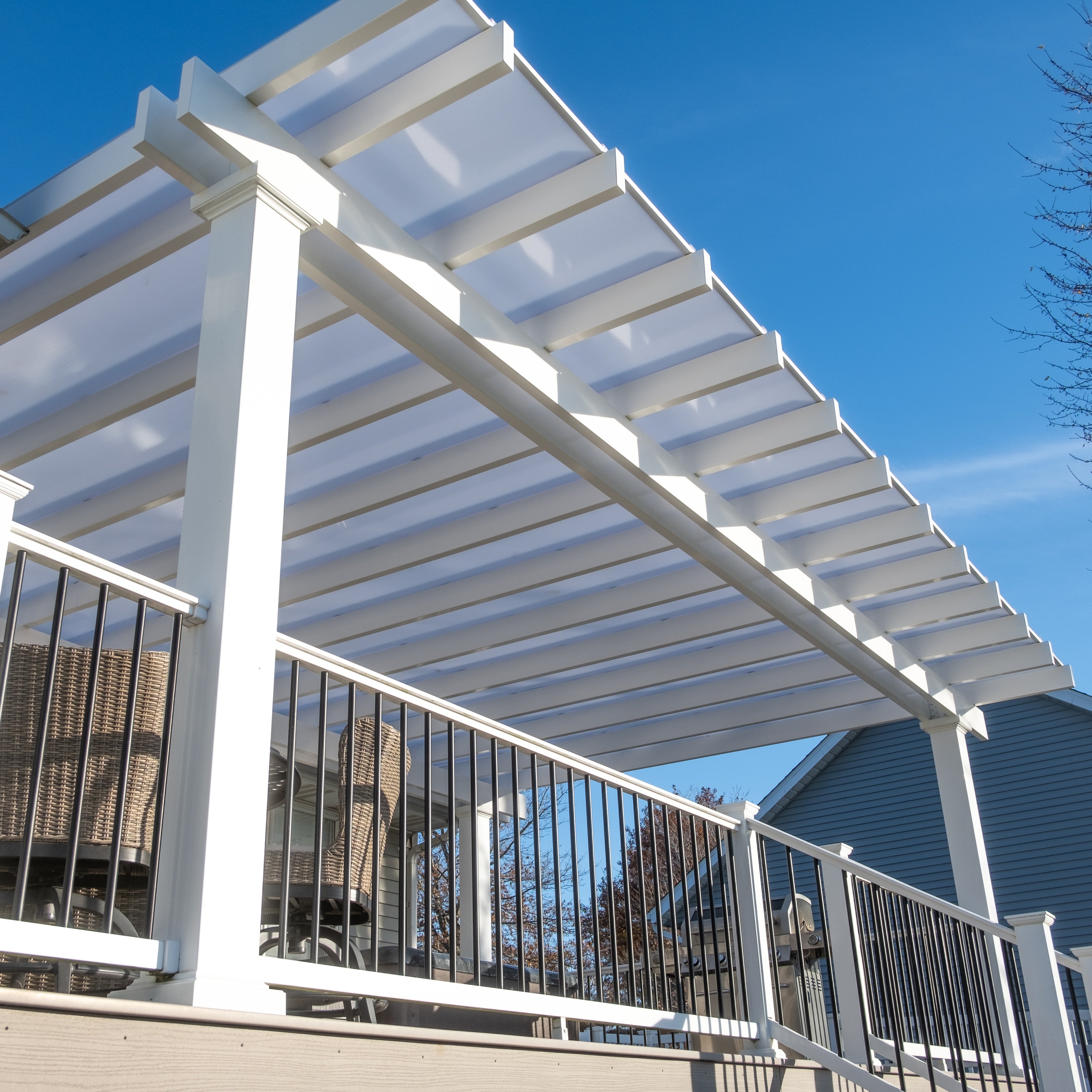 Customized free standing slanted roof patio cover with decorative overhangs