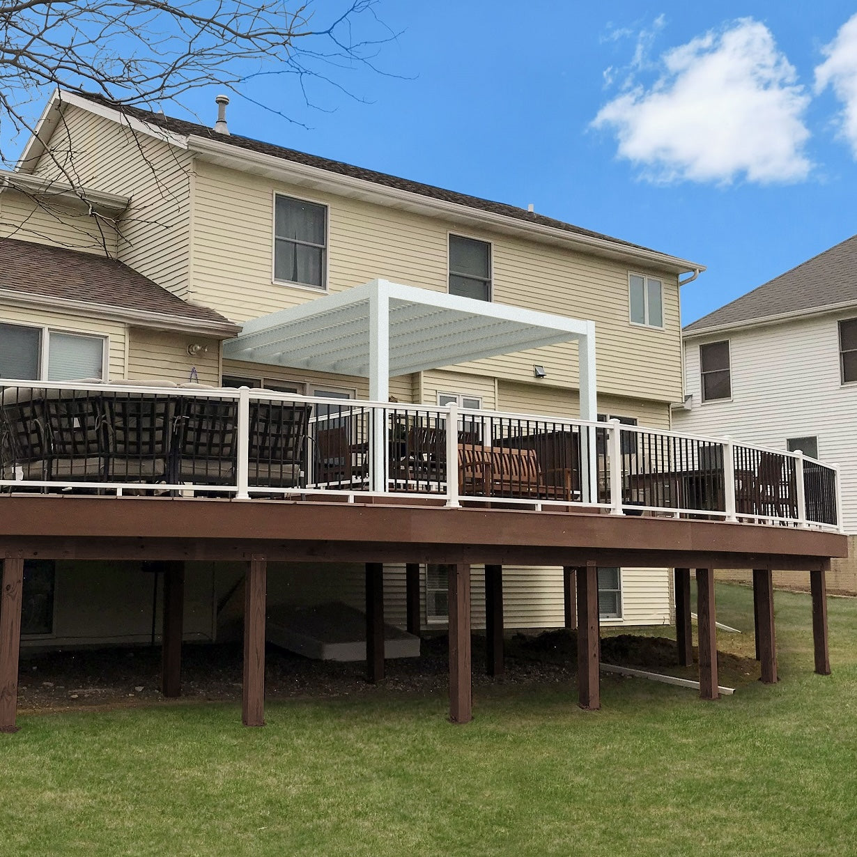 modern attached vinyl pergola with a flush roof outline and two outer support posts