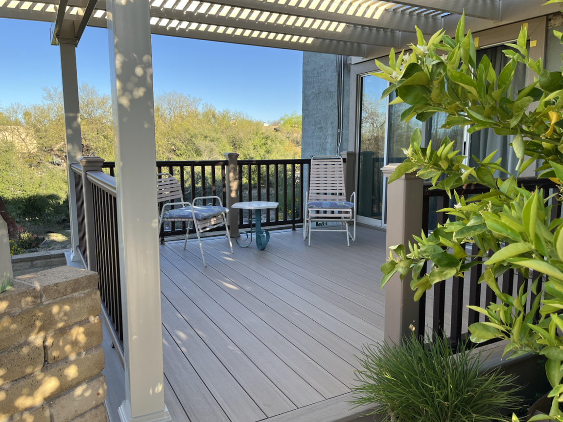 Traditional attached grill pergola with custom slatted roof