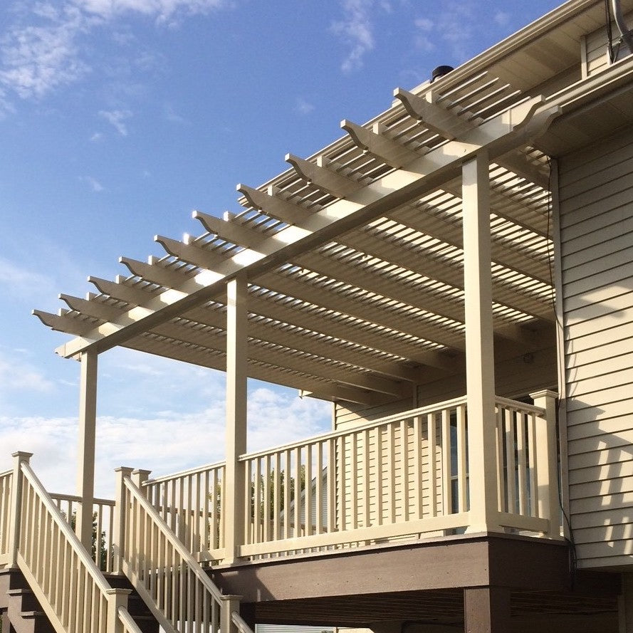 Traditional pergola with roof attached to house