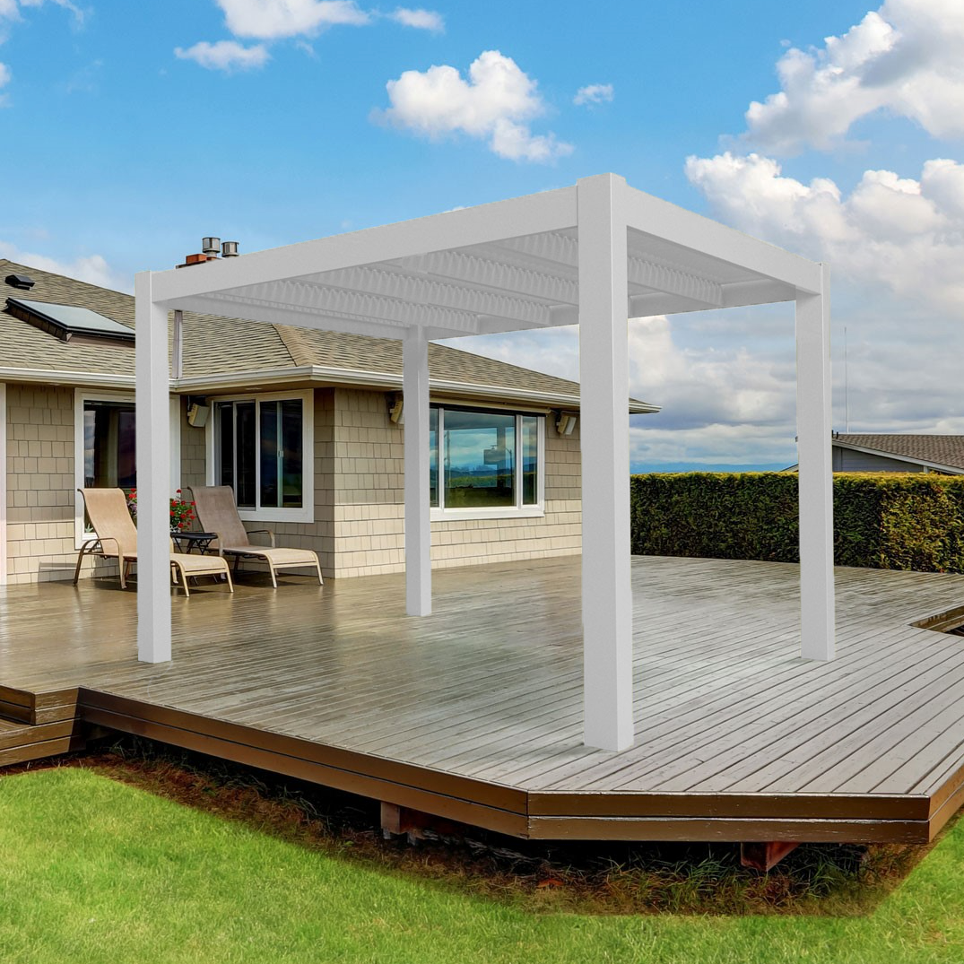 Modern-style white 4-post pergola without overhangs on a dark wood deck behind a tan house