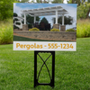 Close-up picture of a yard sign featuring the picture of a white traditional 4-post pergola and a dummy phone number